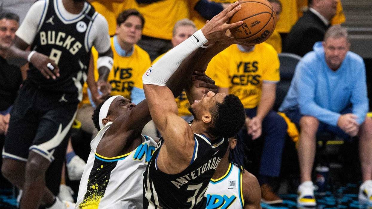 Apr 29, 2025; Indianapolis, Indiana, USA; Milwaukee Bucks forward Giannis Antetokounmpo (34) shoots the ball while Indiana Pacers forward Pascal Siakam (43) defends during game five of the first round for the 2024 NBA Playoffs at Gainbridge Fieldhouse. Mandatory Credit: Trevor Ruszkowski-Imagn Images