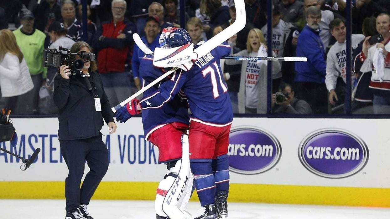 Apr 30, 2019; Columbus, OH, USA; Columbus Blue Jackets goaltender Sergei Bobrovsky (left) and left wing Nick Foligno (right) hug to celebrate, after defeating the Boston Bruins in game three of the second round of the 2019 Stanley Cup Playoffs at Nationwi