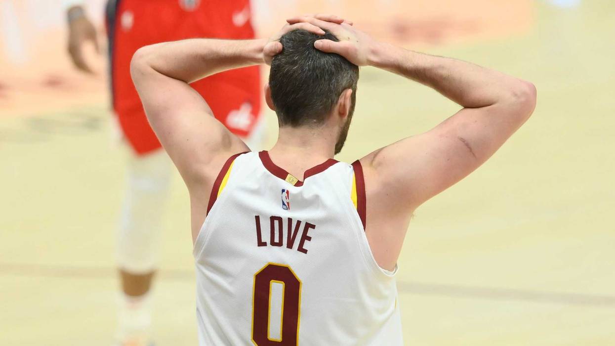 Apr 30, 2021; Cleveland, Ohio, USA; Cleveland Cavaliers forward Kevin Love (0) reacts in the third quarter against the Washington Wizards at Rocket Mortgage FieldHouse.