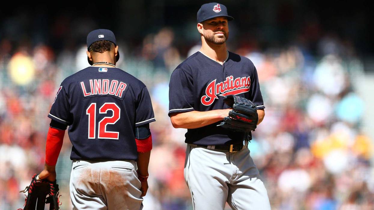 Apr 9, 2017; Phoenix, AZ, USA; Cleveland Indians pitcher Corey Kluber (right) with shortstop Francisco Lindor against the Arizona Diamondbacks at Chase Field. The Diamondbacks defeated the Indians 3-2 to sweep the three game series. Mandatory Credit: Mark