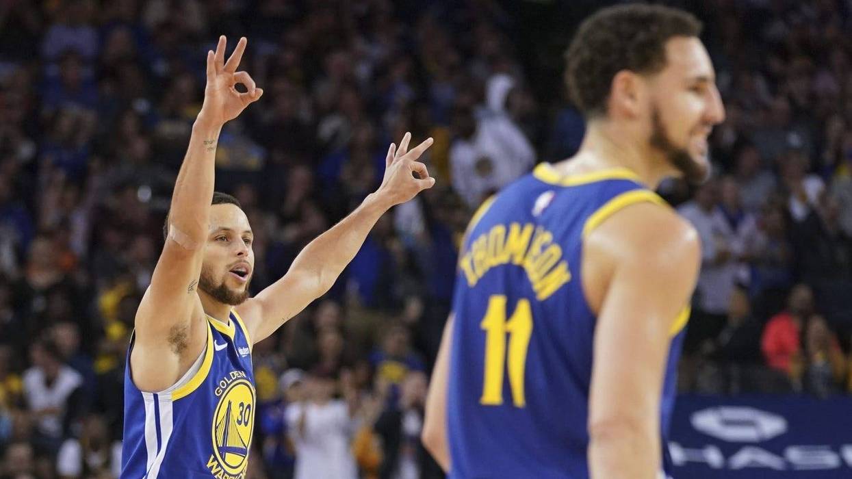 April 5, 2019; Oakland, CA, USA; Golden State Warriors guard Stephen Curry (30) and guard Klay Thompson (11) celebrate after a made three-point basket against the Cleveland Cavaliers during the second quarter at Oracle Arena.
