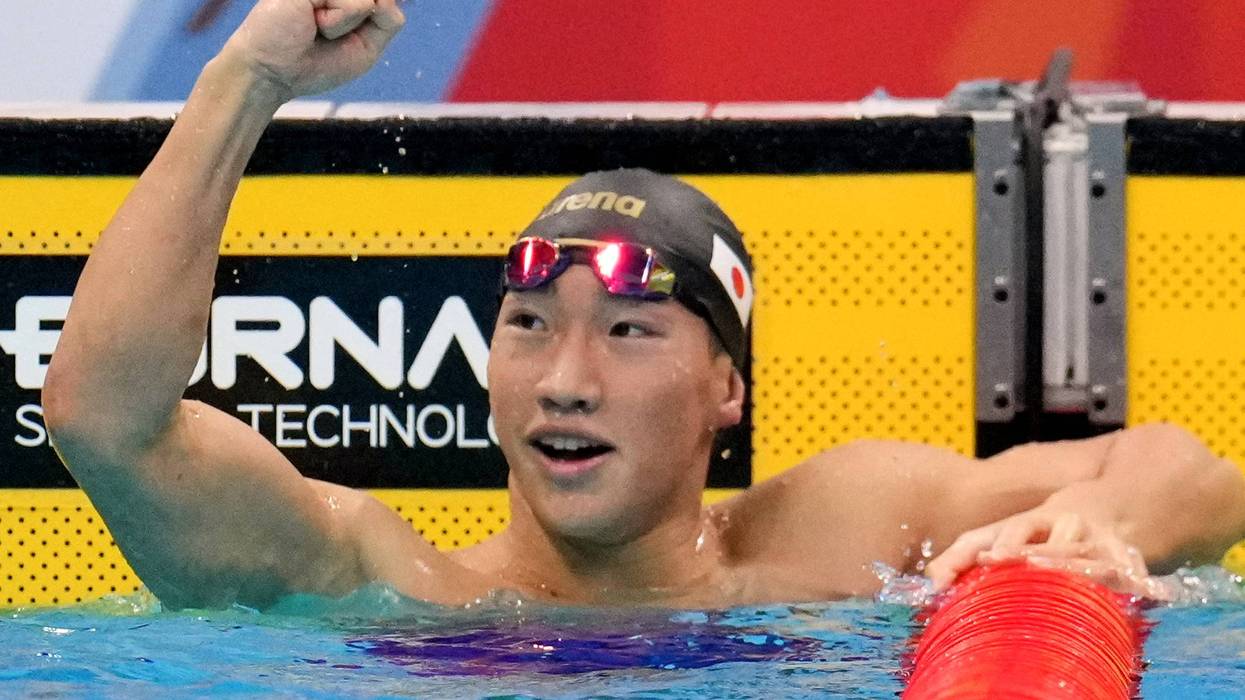 APTOPIX Asian Games Swimming