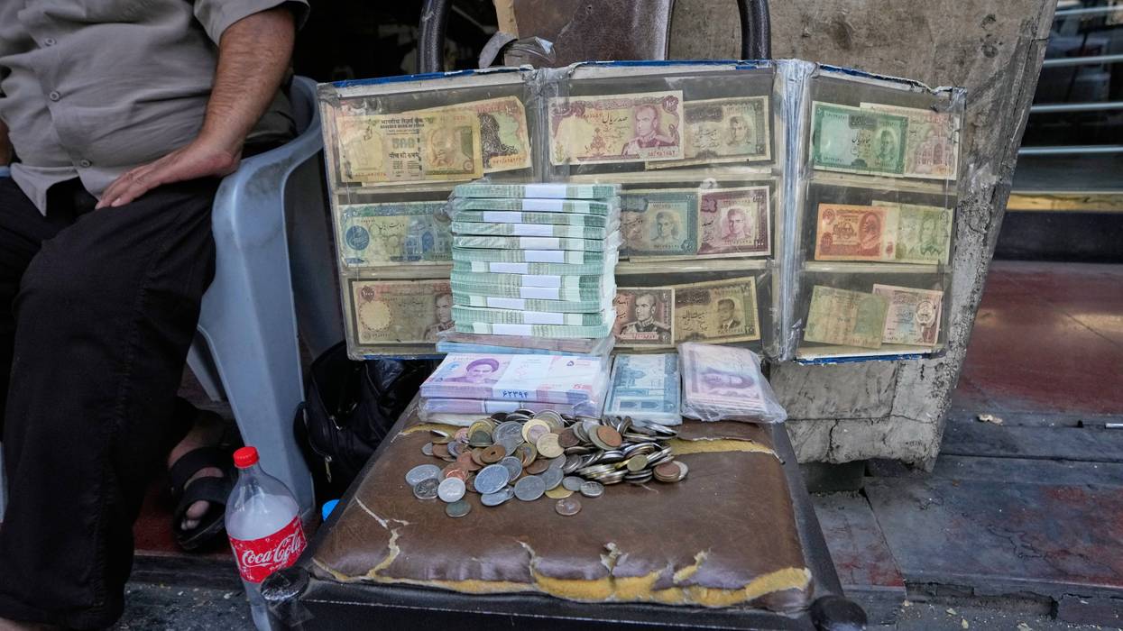 APTOPIX Iran Currency