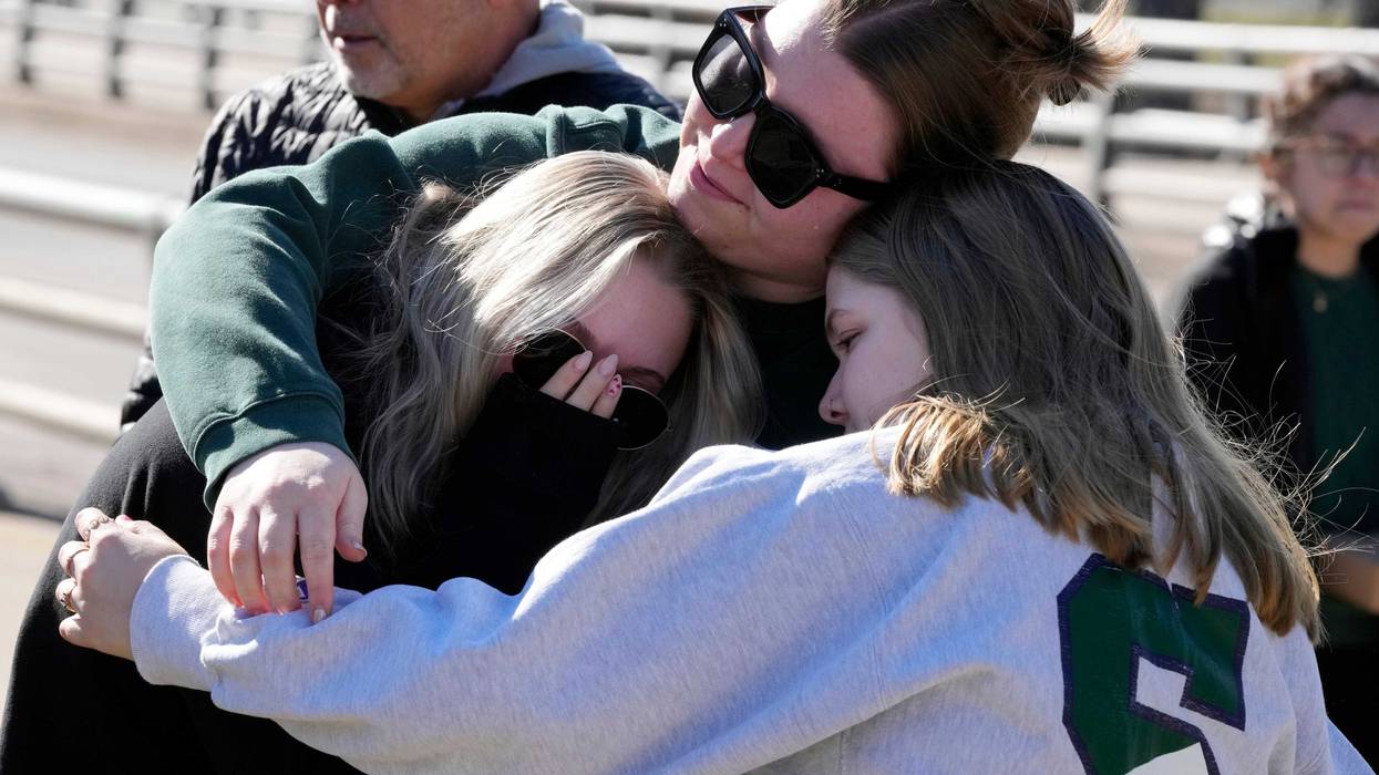 APTOPIX MIchigan State Shooting