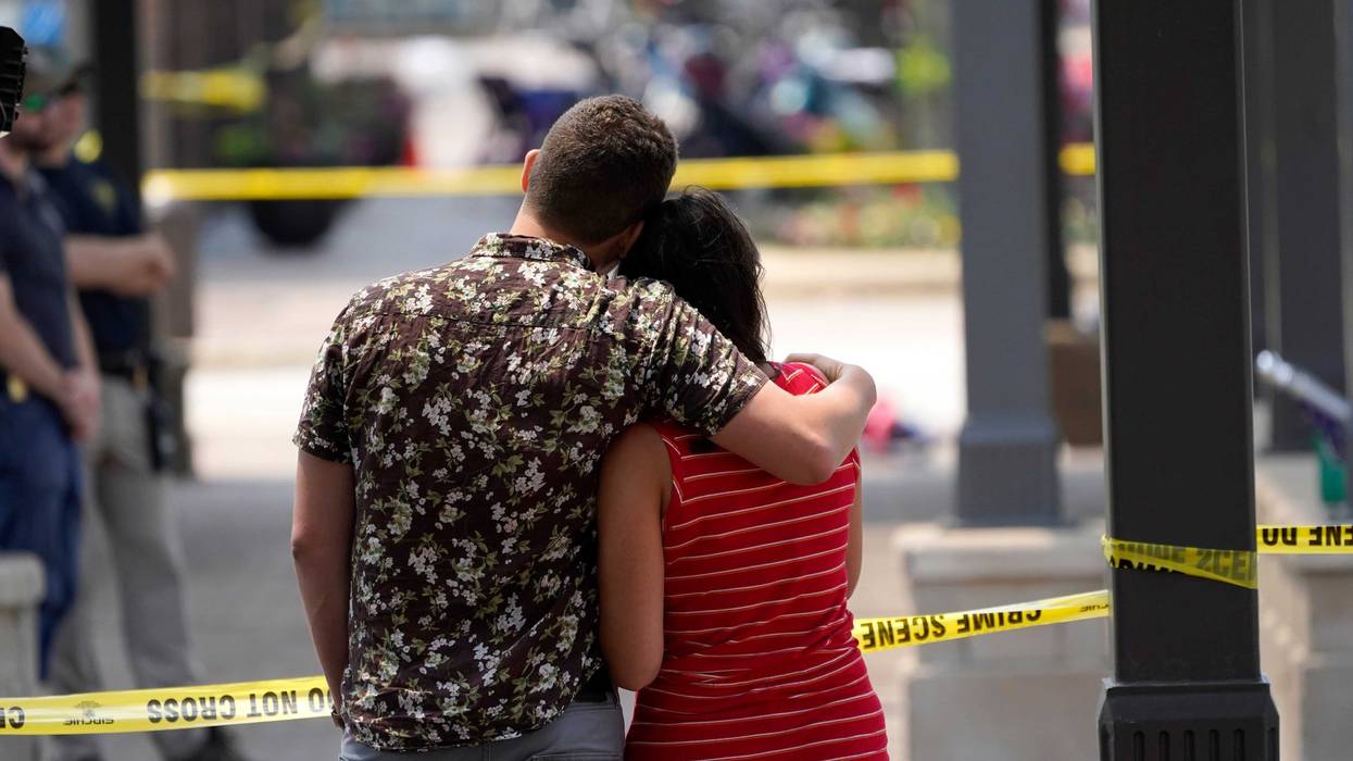 APTOPIX Shooting July Fourth Parade