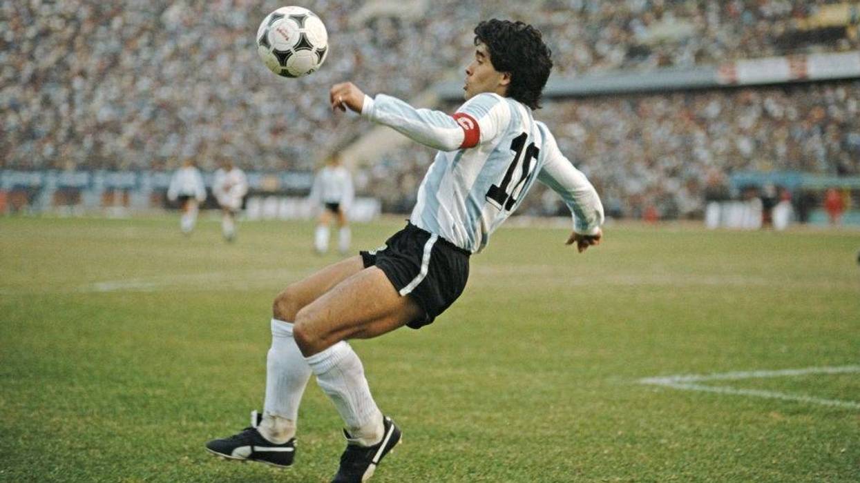 Argentina player Diego Maradona in action during a 1986 FIFA World Cup qualifying match against Peru at the National Stadium on June 23, 1985 in Lima, Peru