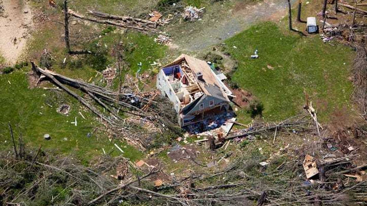 Arial view of a home destroyed by a tornado.