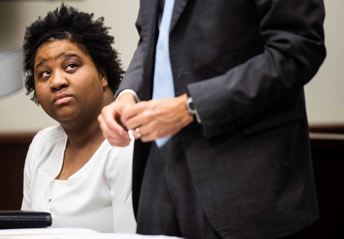 Ariel Robinson sits next to her Attorney Bill Bouton, in court during a court hearing at the Greenville County courthouse, Thursday, April 14, 2022.
