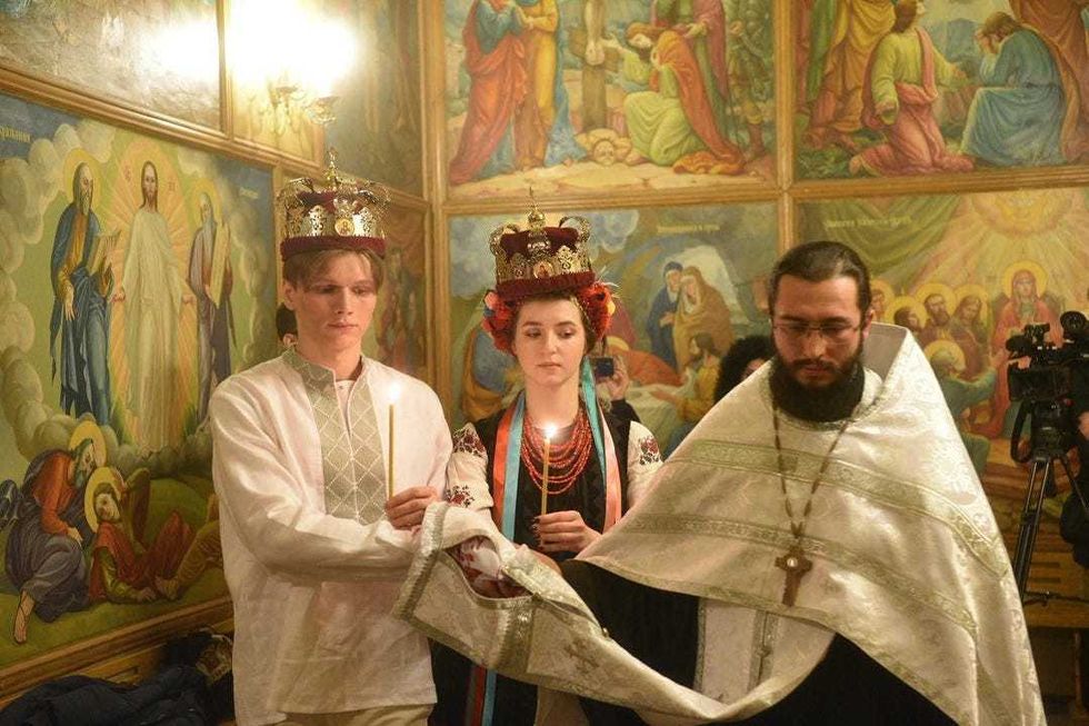 Arieva and Fursin at their wedding on Feb. 24, the day Russia invaded Ukraine