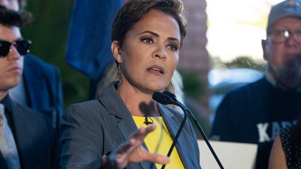 Arizona Republican U.S. Senate candidate and far-right election denier Kari Lake takes questions with U.S. Sen. John Barrasso (R-WY) at a news conference on February 29, 2024 in Phoenix, Arizona.