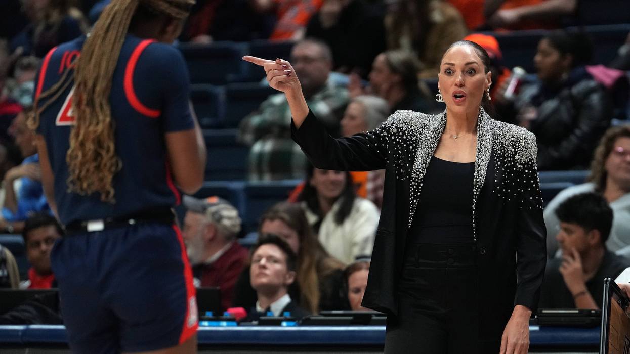 Arizona Wildcats head coach Adia Barnes talks to Skylar Jones #4 during the first half of a First Four game of the NCAA Women's Basketball Tournament at the Harry A. Gampel Pavilion on March 21, 2024, in Storrs, Connecticut.
