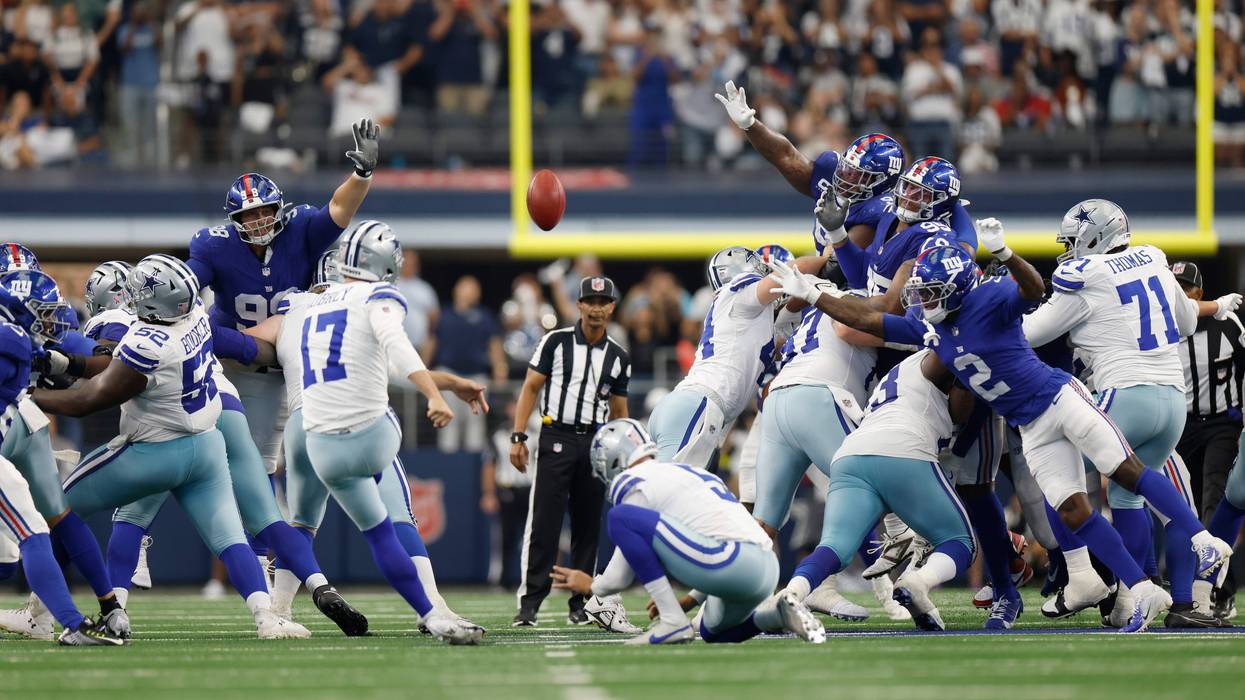 ARLINGTON, TEXAS - SEPTEMBER 14: Brandon Aubrey #17 of the Dallas Cowboys kicks a field goal to force overtime in the fourth quarter of the game against the New York Giants at AT&T Stadium on September 14, 2025 in Arlington, Texas. (Photo by Ron Jenkins/Getty Images)