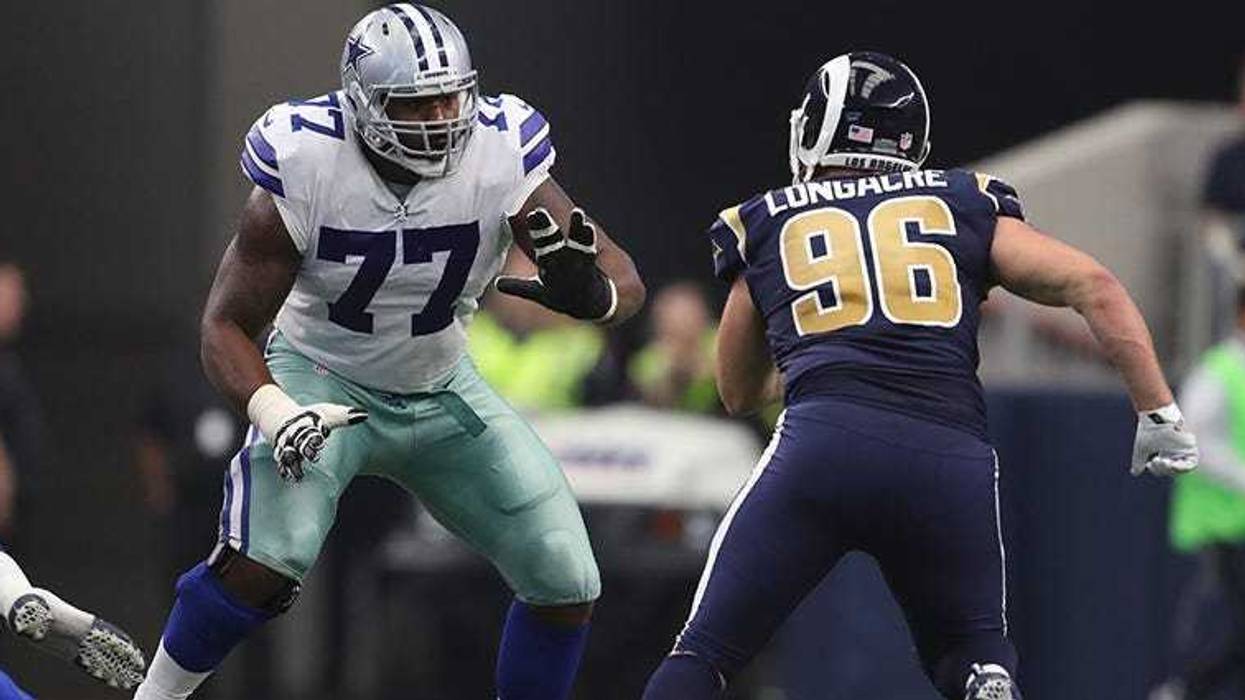Arlington, TX, USA; Dallas Cowboys tackle Tyron Smith (77) in action against the Los Angeles Rams at AT&T Stadium on Oct 1, 2017.