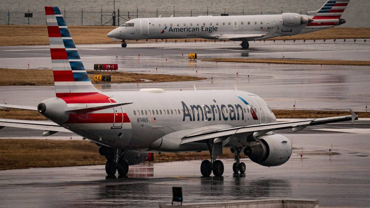 ARLINGTON, VIRGINIA - FEBRUARY 6: An American Eagle and American Airlines plane taxi on the runway at Ronald Reagan National Airport, on February 6, 2025 in Arlington, Virginia. An American Airlines flight from Wichita, Kansas collided midair with a military Black Hawk helicopter while on approach to Ronald Reagan Washington National Airport on January 29, 2025 outside of Washington, DC.(Photo by Al Drago/Getty Images)