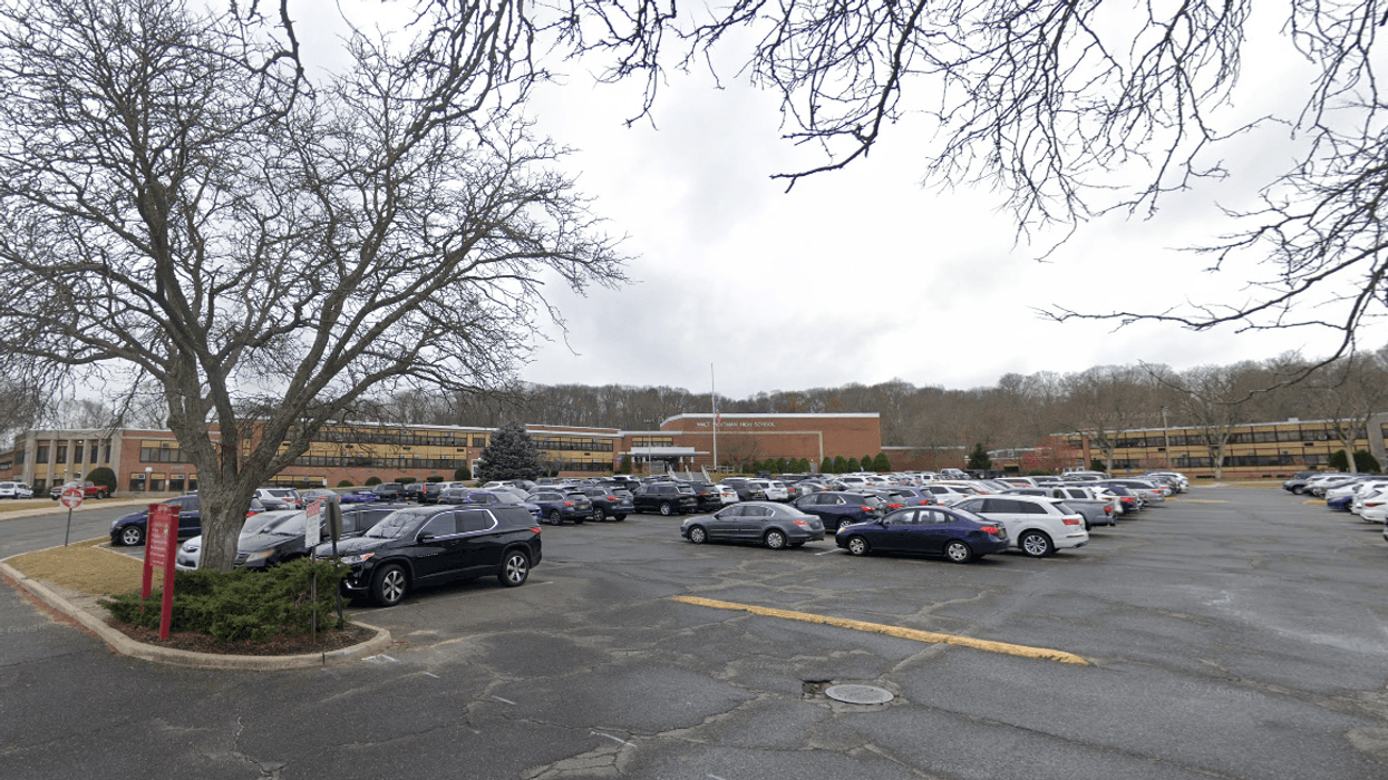 Armed security guards will be stationed outside Walt Whitman High School and other school buildings in South Huntington