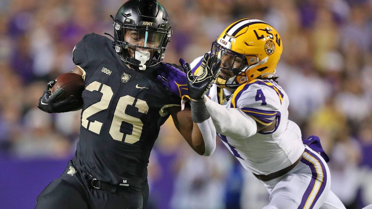Army Black Knights running back Kanye Udoh (26) is hit by LSU Tigers linebacker Harold Perkins Jr.
