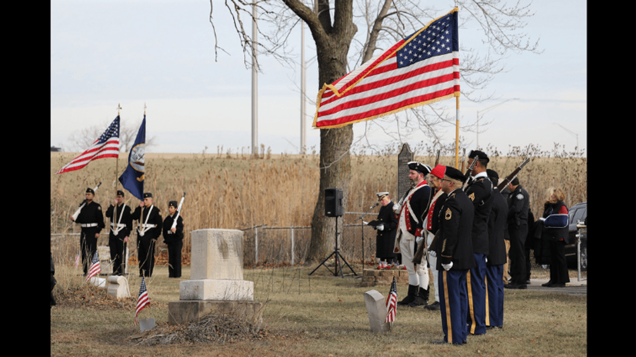 Army Reserve Soldiers lay wreaths for veterans dating back to the Revolutionary War