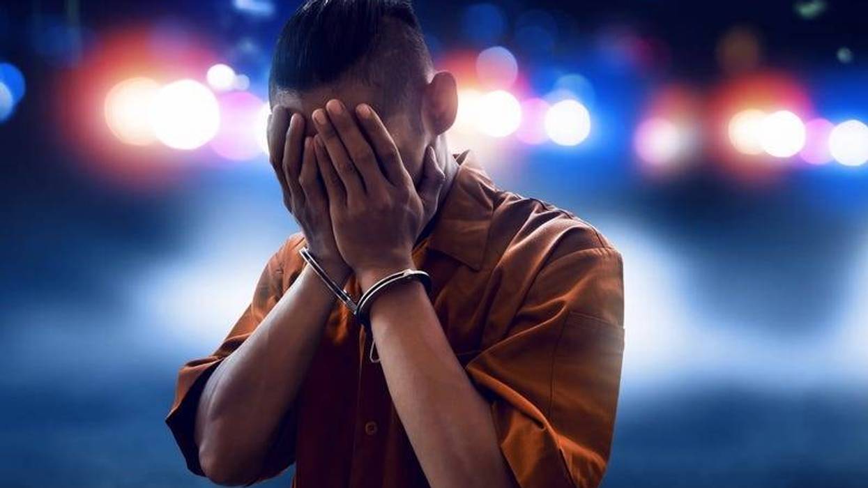 Arrested man in handcuffs.
