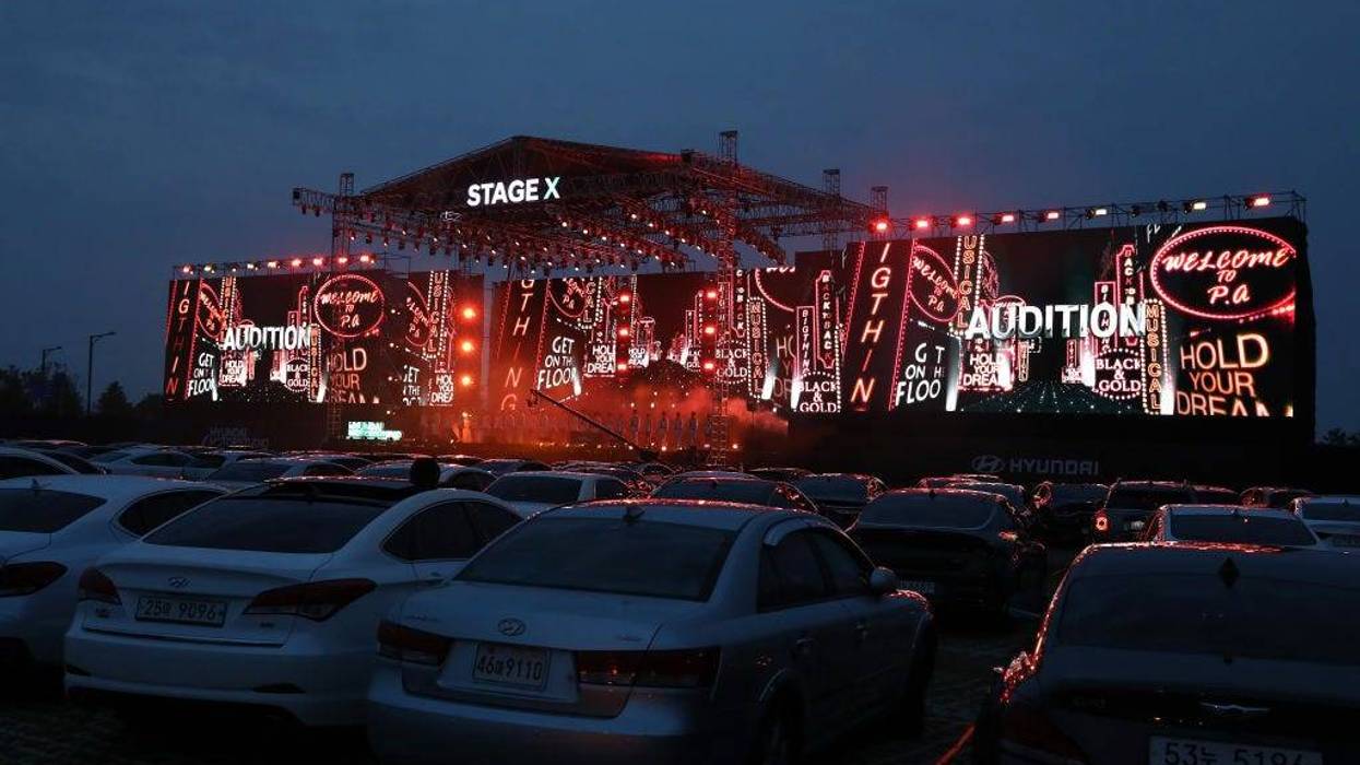 ars are parked at a drive-in musical operation by Hyundai Motor at Stage X Drive-in Concert as South Koreans take measures to protect themselves against the spread of coronavirus (COVID-19) on May 23, 2020 in Goyang, South Korea.