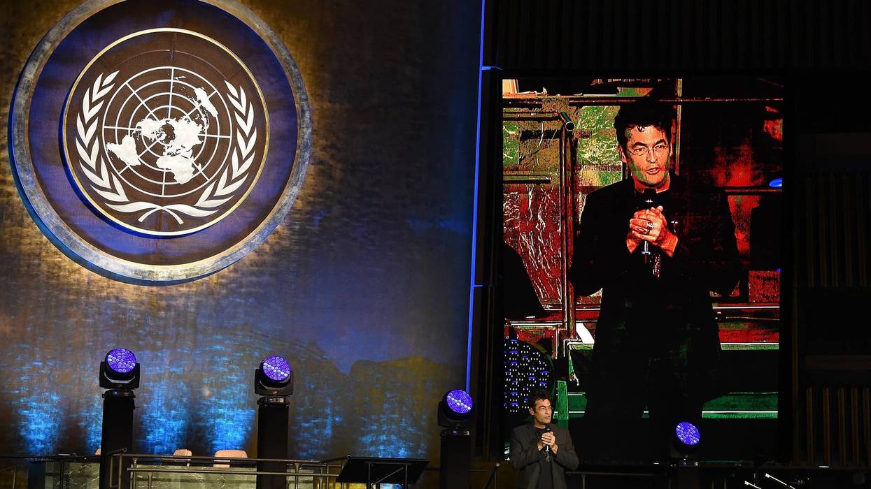 Artist Chris Jordan giving a speech at the UN