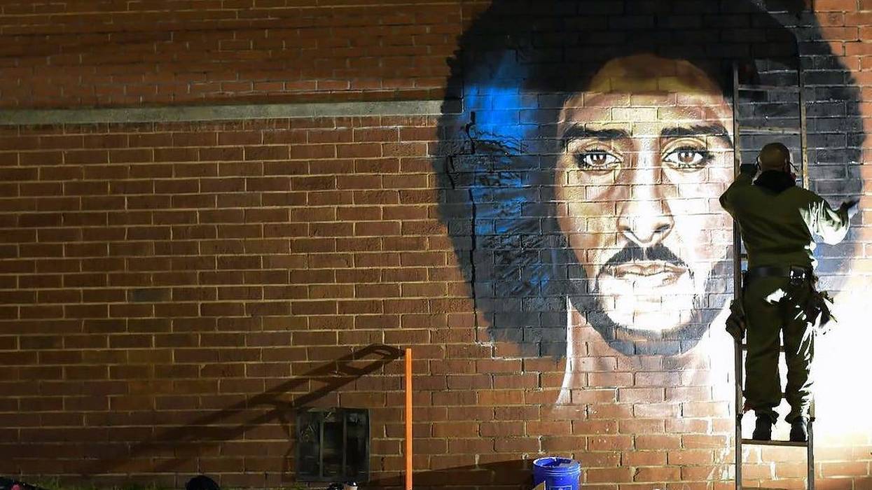 Artist Fabian Williams paints a new Colin Kaepernick mural in response to his "Kaeplanta" mural being demolished on Feb 1 before Super Bowl 53
