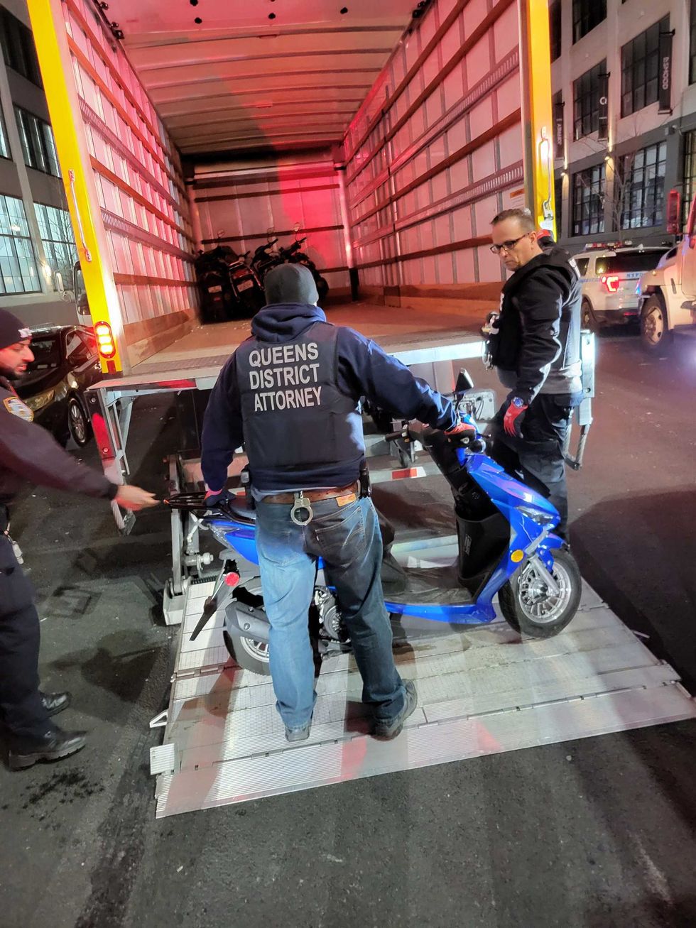 As part of a joint effort, NYPD officers and detectives from the Queens District Attorney