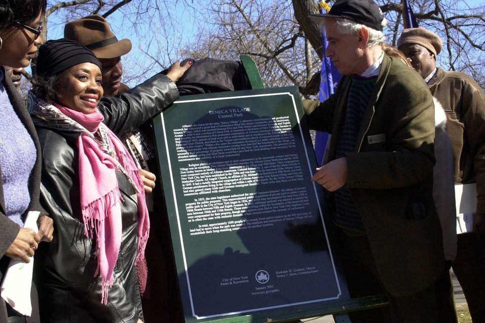 As part of the celebration of Black History Month, a historical sign is unveiled commemorating Seneca Village, probably Manhattan