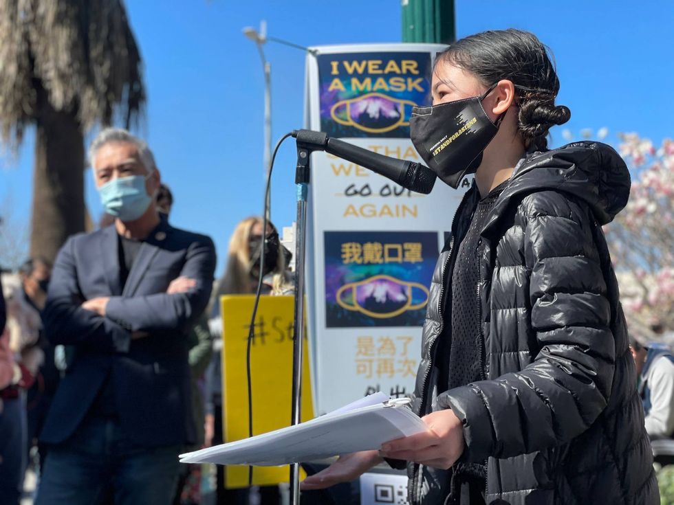 Ashlyn So speaking to the crowd of hundreds in San Mateo.