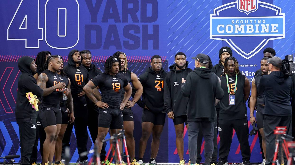 Ashton Jeanty #RB15 of Boise State looks on with others during the NFL Scouting Combine at Lucas Oil Stadium on March 01, 2025 in Indianapolis, Indiana.