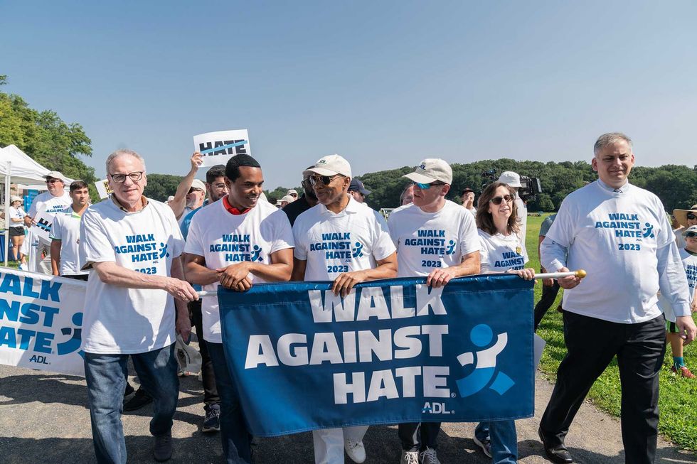 Assemblyman Jeffrey Dinowitz, U.S. Rep. Ritchie Torres (D-NY),New York City Mayor Eric Adams, ADL regional director Scott Richman and Israel Nitzan, Acting Consul General of Israel in New York attend Anti-Defamation League annual Walk Against Hate in Van Cortland Park in New York on August 20, 2023.