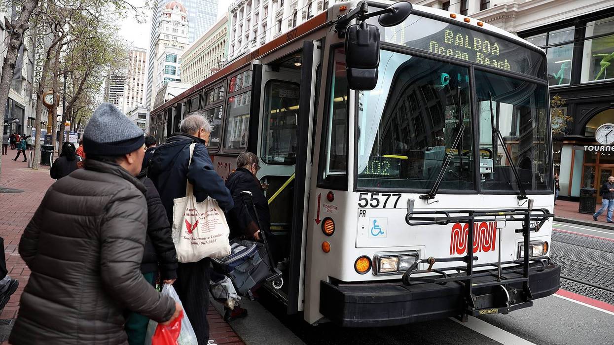 assengers board a MUNI bus on March 21, 2018 in San Francisco, California.