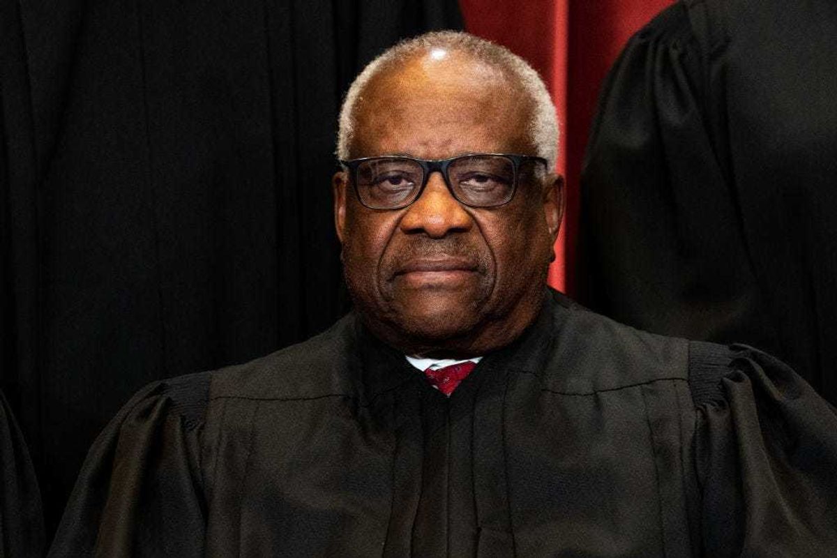 Associate Justice Clarence Thomas sits during a group photo of the Justices at the Supreme Court in Washington, DC on April 23, 2021. (Photo by Erin Schaff-Pool/Getty Images)