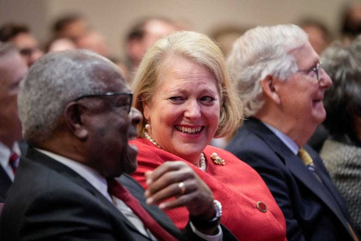 Associate Supreme Court Justice Clarence Thomas sits with his wife and conservative activist Virginia Thomas while he waits to speak at the Heritage Foundation on October 21, 2021 in Washington, DC. Clarence Thomas has now served on the Supreme Court for 30 years. He was nominated by former President George H. W. Bush in 1991 and is the second African-American to serve on the high court, following Justice Thurgood Marshall. (Photo by Drew Angerer/Getty Images)
