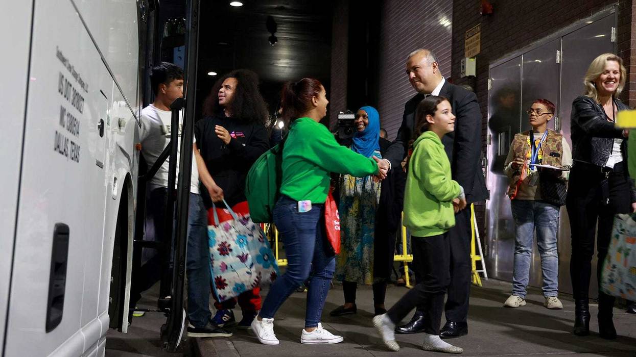 Asylum seekers are greeted at the Port Authority in Manhattan.