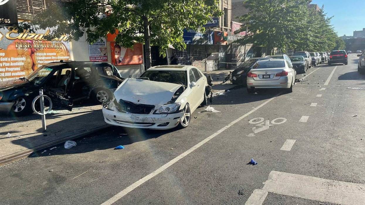 At least five vehicles appeared to be damaged as police investigated at Sherman Avenue and W. 207th Street in Inwood on Wednesday morning