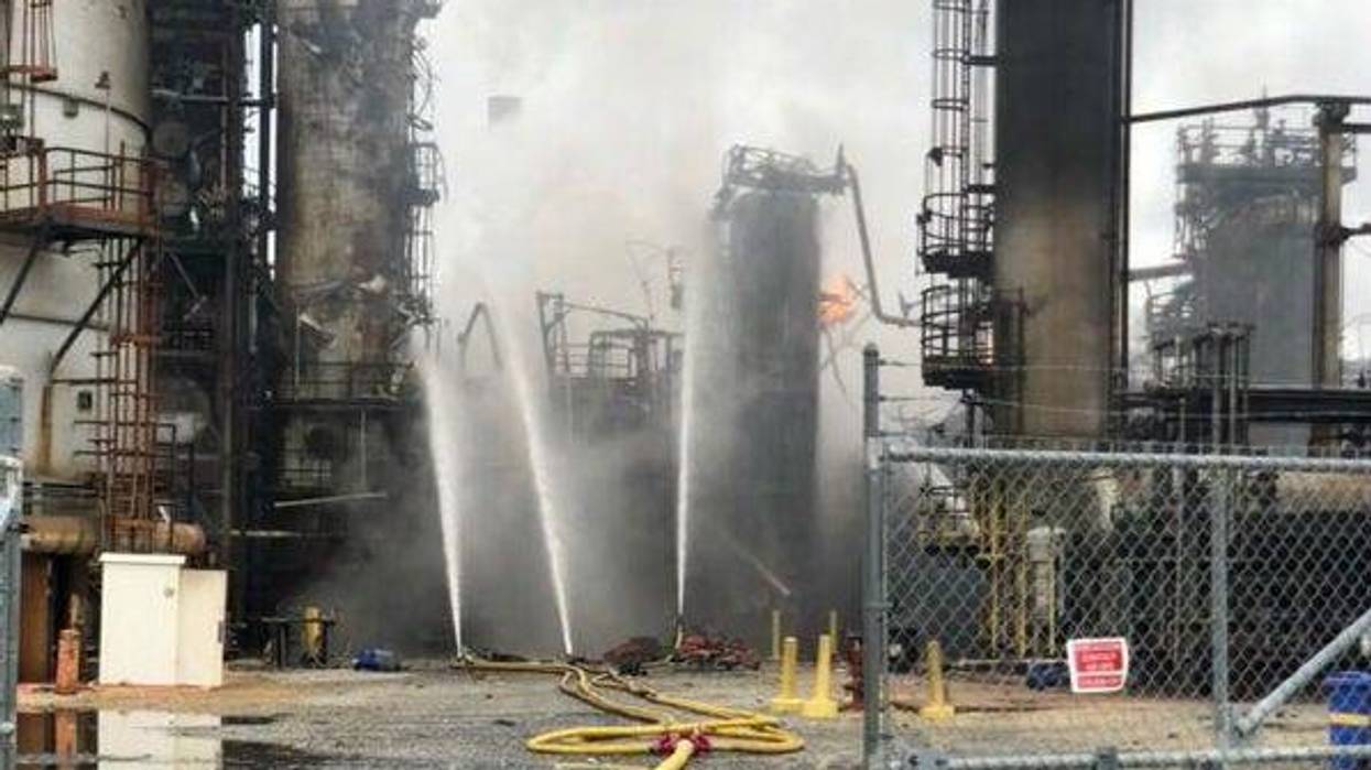 At the scene of an explosion at a Southwest Philadelphia refinery, the resulting fire is contained but not yet under control.