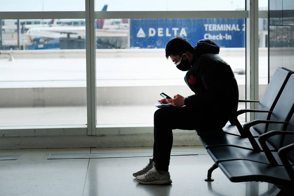 At the terminal that serves planes bound for China, people wear medical masks out of concern over the Coronavirus at John F. Kennedy Airport (JFK) out of concern over the Coronavirus on January 31, 2020 in New York City.