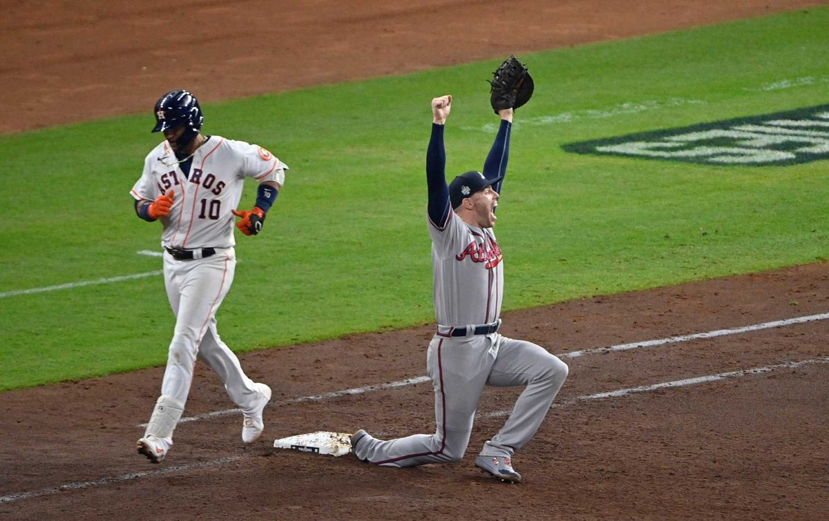 Atlanta Braves first baseman Freddie Freeman (5) celebrates after forcing out Houston Astros first baseman Yuli Gurriel (10) for the final out during game six of the 2021 World Series at Minute Maid Park.