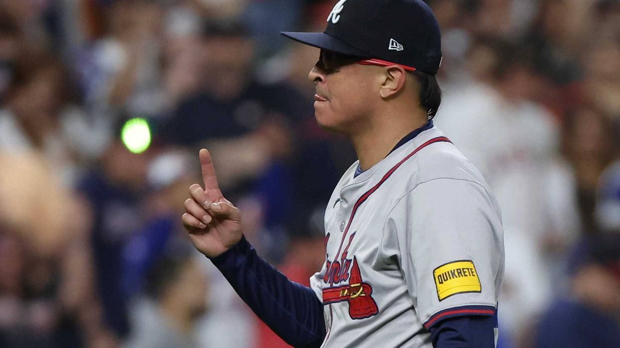 Atlanta Braves pitcher Jesse Chavez (60) celebrates the win against the Houston Astros in the ninth inning at Minute Maid Park.