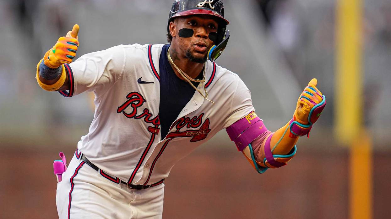 Atlanta Braves right fielder Ronald Acuna Jr (13) reacts after hitting a lead off home run against the New York Mets during the first inning at Truist Park.