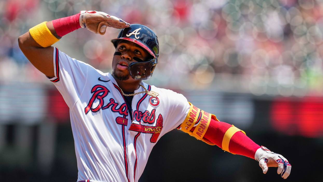 Atlanta Braves right fielder Ronald Acuna Jr. (13) reacts after hitting a two run home run against the Miami Marlins