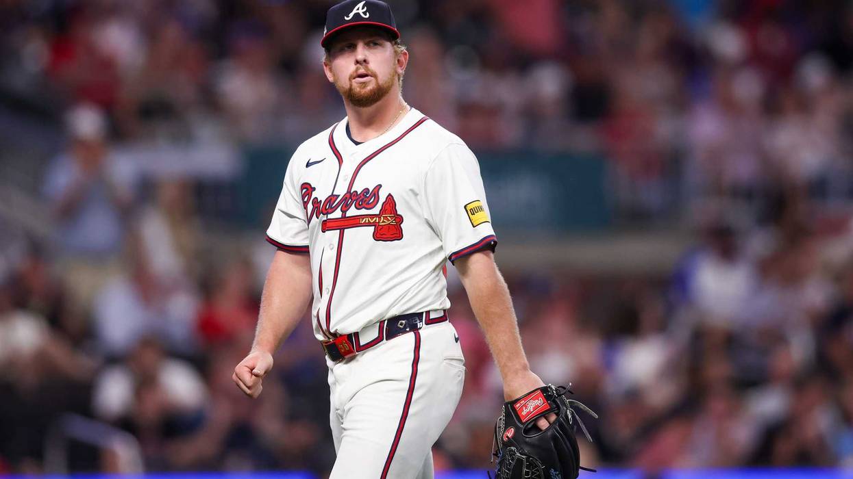 Atlanta Braves starting pitcher Spencer Schwellenbach (56) walks off the field against the Miami Marlins in the eighth inning at Truist Park.