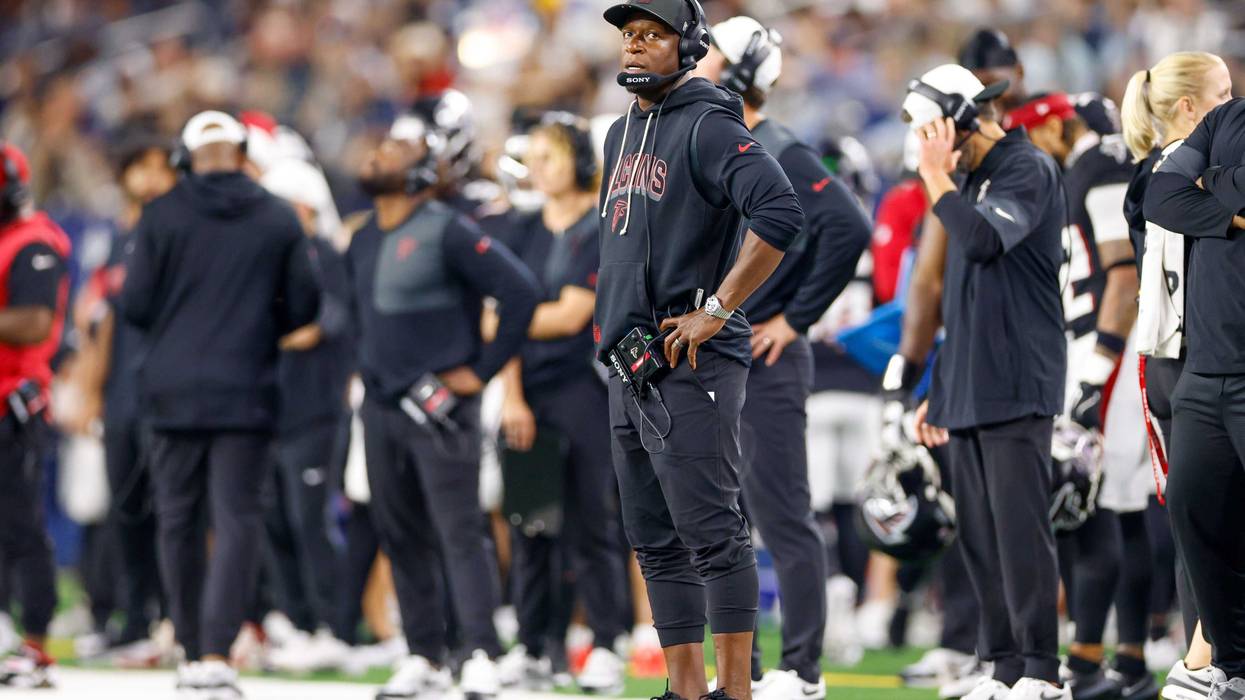 Atlanta Falcons head coach Raheem Morris looks up at scoreboard during the fourth quarter against the Dallas Cowboys