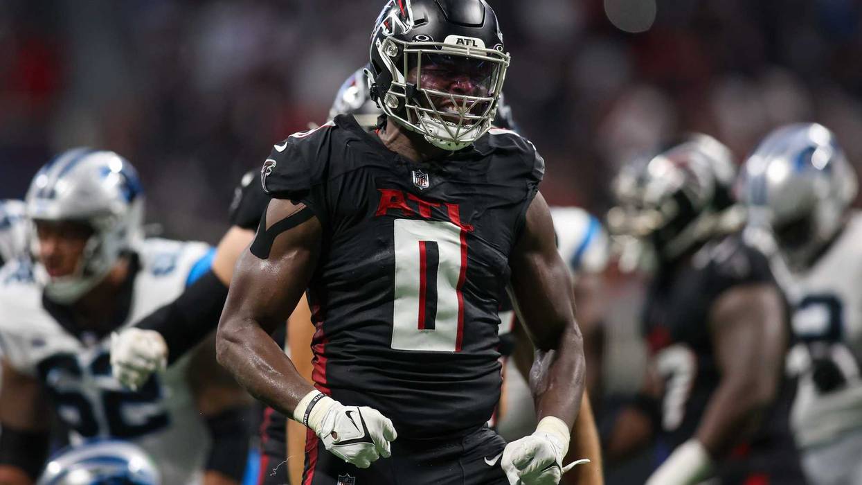 Atlanta Falcons linebacker Lorenzo Carter (0) celebrates after a sack against the Carolina Panthers in the second half at Mercedes-Benz Stadium.