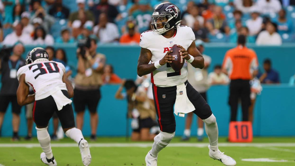 Atlanta Falcons quarterback Michael Penix Jr. (9) looks for a passing option against the Miami Dolphins during the first quarter at Hard Rock Stadium.