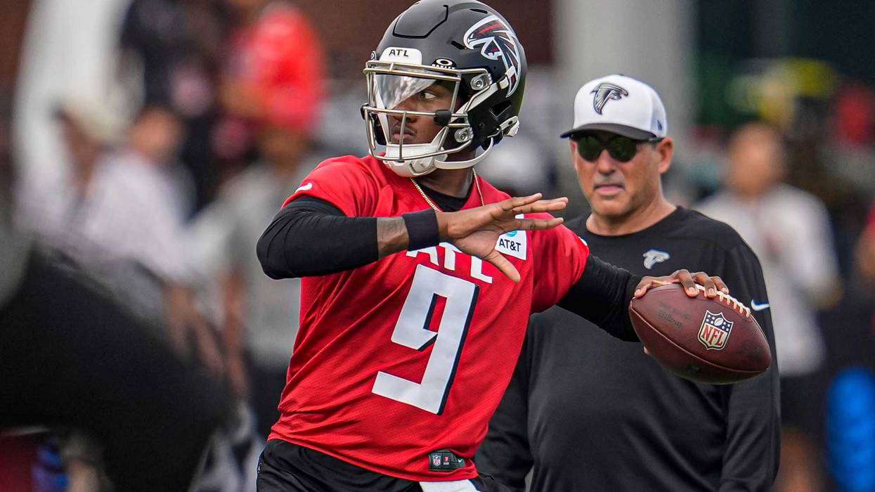 Atlanta Falcons quarterback Michael Penix Jr. (9) passes during training camp at IBM Performance Field.