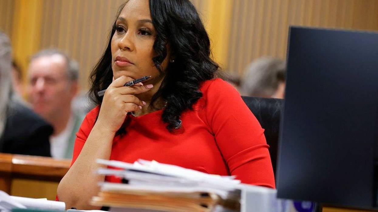 ATLANTA, GA - MARCH 01: Fulton County District Attorney Fani Willis looks on during a hearing in the case of the State of Georgia v. Donald John Trump at the Fulton County Courthouse on March 1, 2024, in Atlanta, Georgia. The hearing is to determine whether Fulton County District Attorney Fani Willis should be removed from the case because of a relationship with Nathan Wade, special prosecutor she hired in the election interference case against former President Donald Trump.