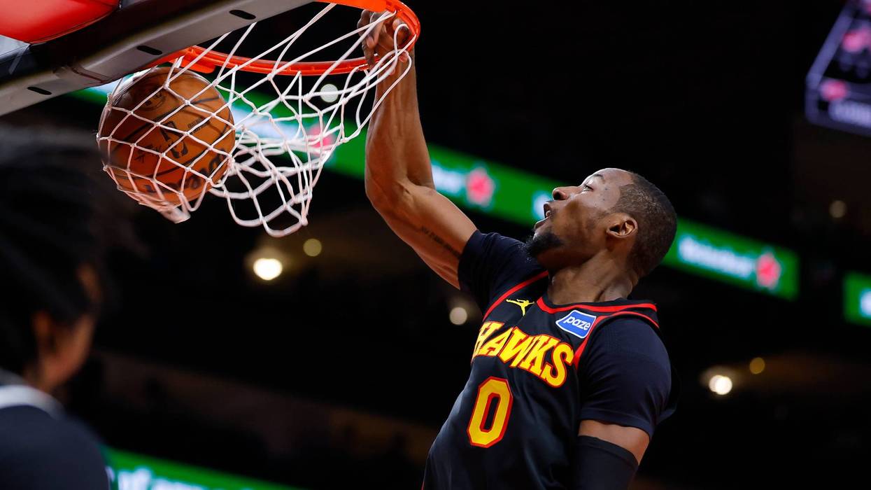 ATLANTA, GEORGIA - FEBRUARY 24: Jonathan Kuminga #0 of the Atlanta Hawks dunks during the third quarter against the Washington Wizards at State Farm Arena on February 24, 2026 in Atlanta, Georgia.