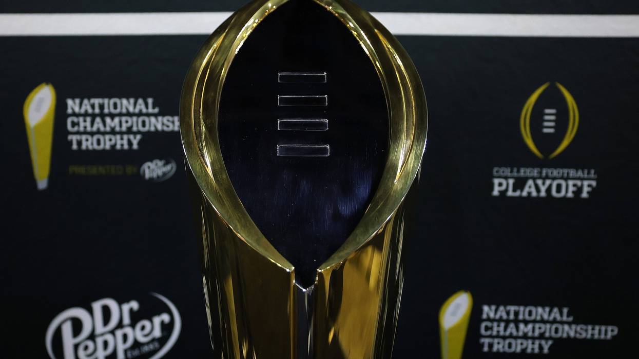 ATLANTA, GEORGIA - JANUARY 18: A detailed view of the CFP National Championship Trophy during media day at the Georgia World Congress Center prior to the 2025 CFP National Championship between the Ohio State Buckeyes and Notre Dame Fighting Irish on January 18, 2025 in Atlanta, Georgia. (Photo by Kevin C. Cox/Getty Images)