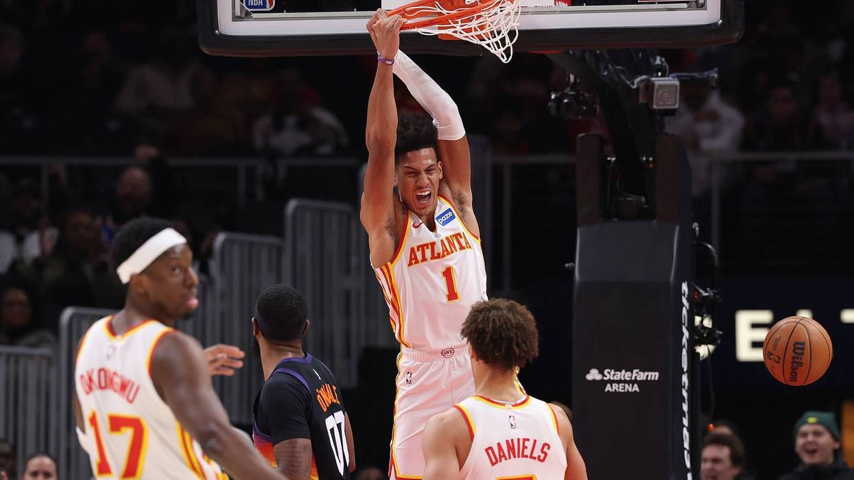 ATLANTA, GEORGIA - JANUARY 23: Jalen Johnson #1 of the Atlanta Hawks dunks against the Phoenix Suns during the first quarter at State Farm Arena on January 23, 2026 in Atlanta, Georgia